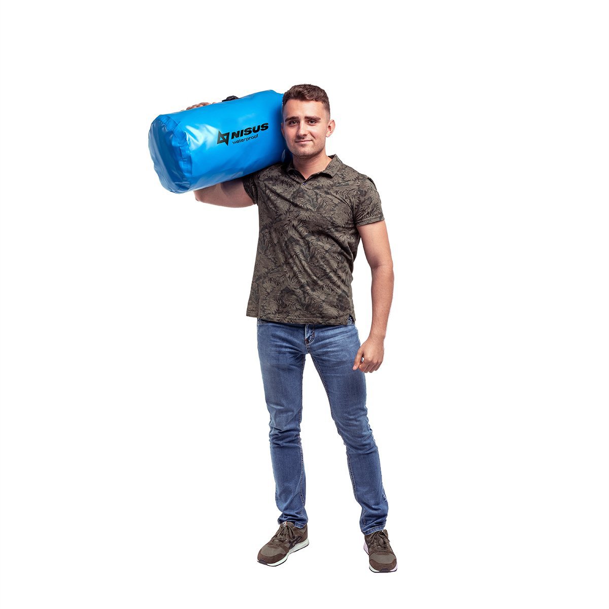 A man carrying a 30 L Blue Waterproof Compact Dry Bag