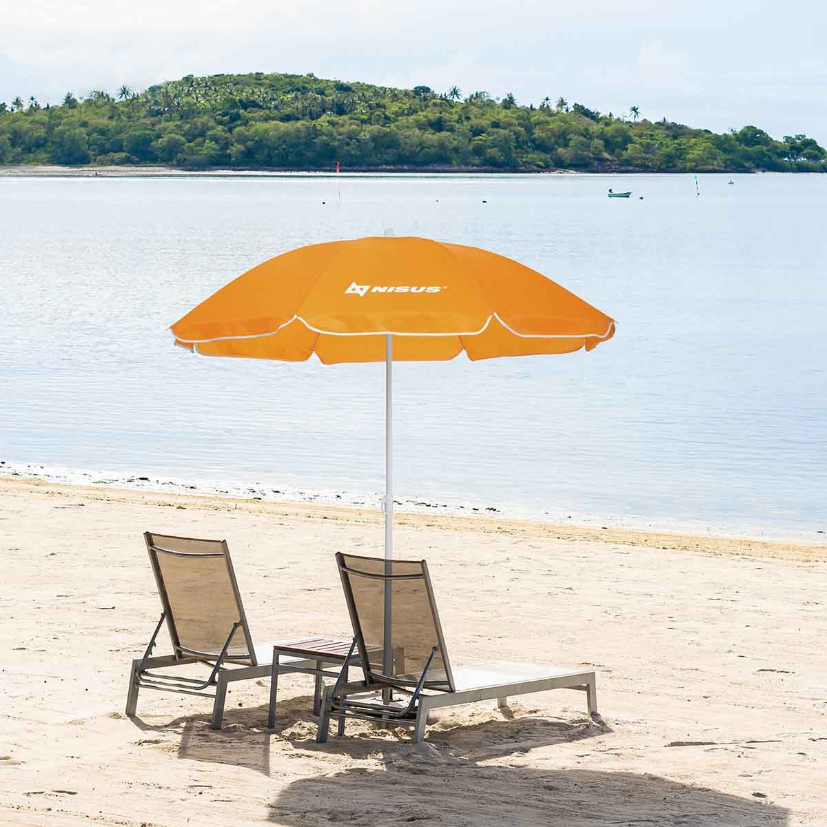 Orange Folding Beach Umbrella standing between the two loungers at the beach