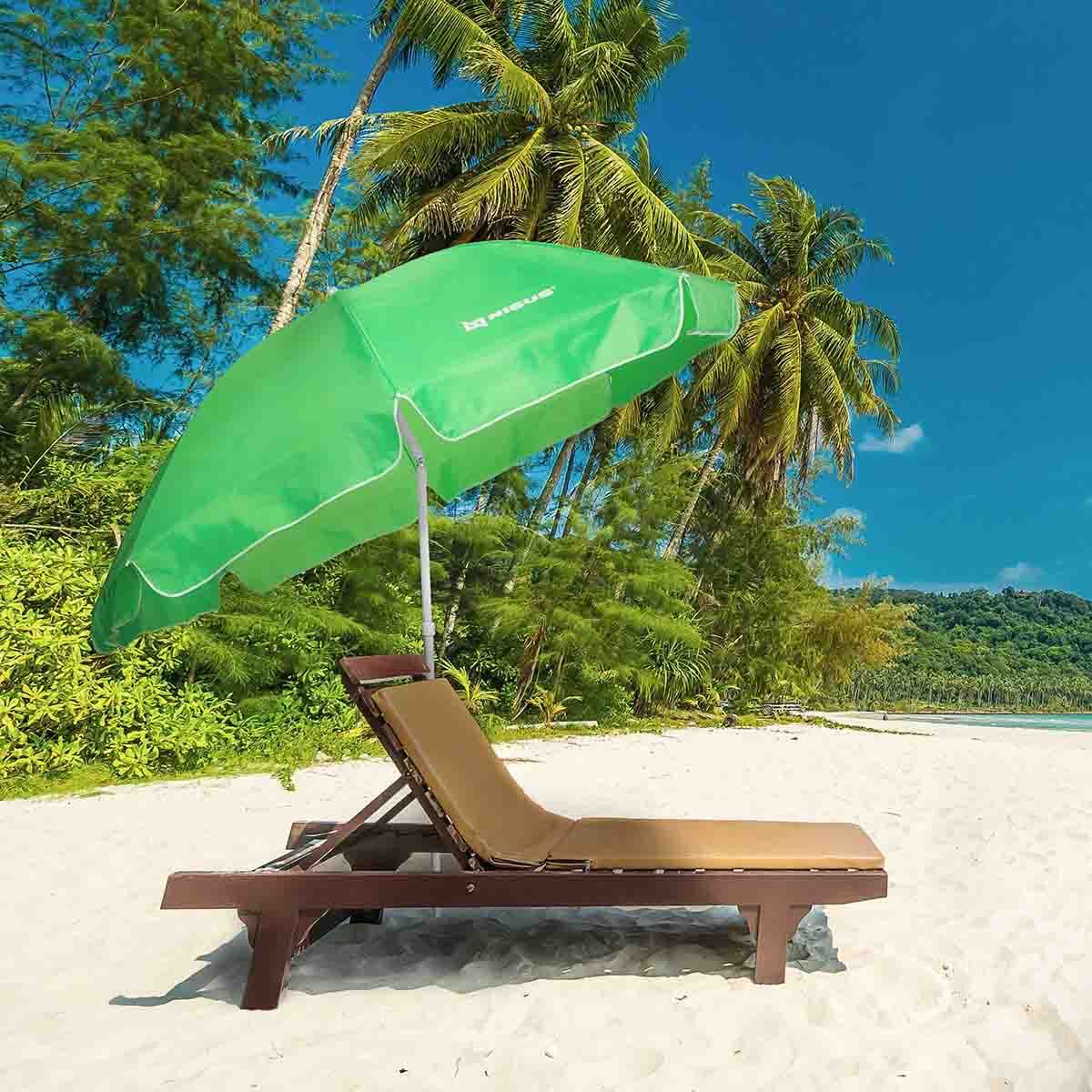 Green Folding Tilting Beach Umbrella standing between two loungers on the beach