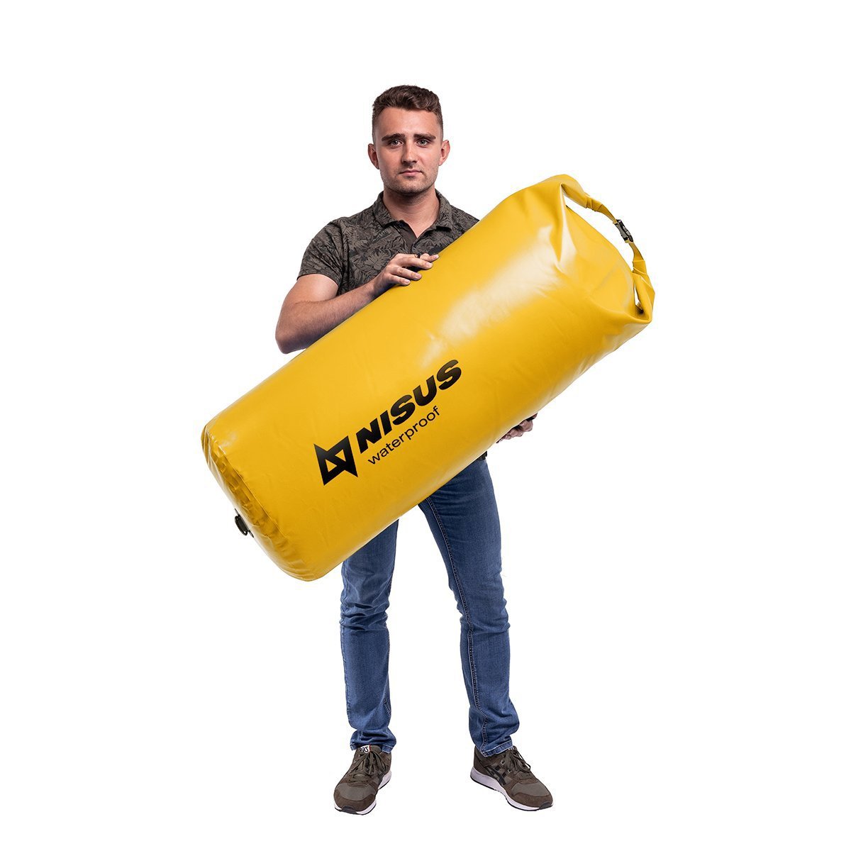 A man carrying a 160 L Waterproof Extra Large Dry Bag, Yellow