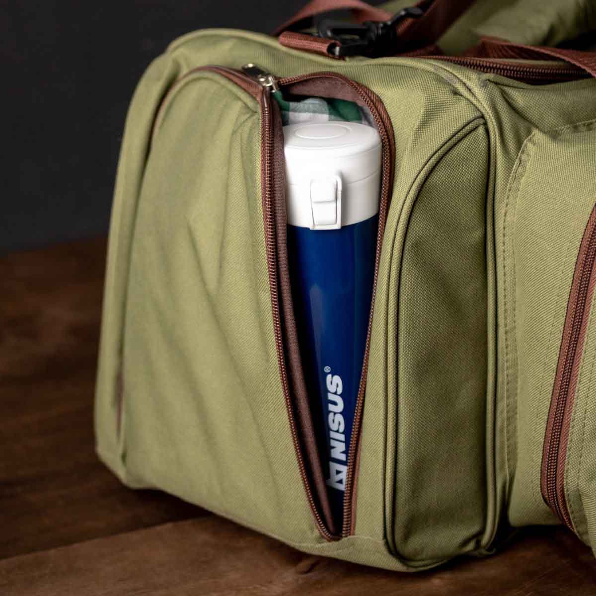 Push Button Lid Water Bottle, Stainless Steel, 16 oz is packed in a travel bag