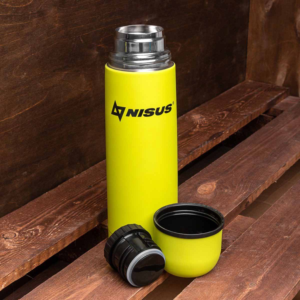 Portable Insulated Vacuum Flask with 2 Lid Cups, 25 oz, Limited Edition, Lime color is standing open on the wooden bench