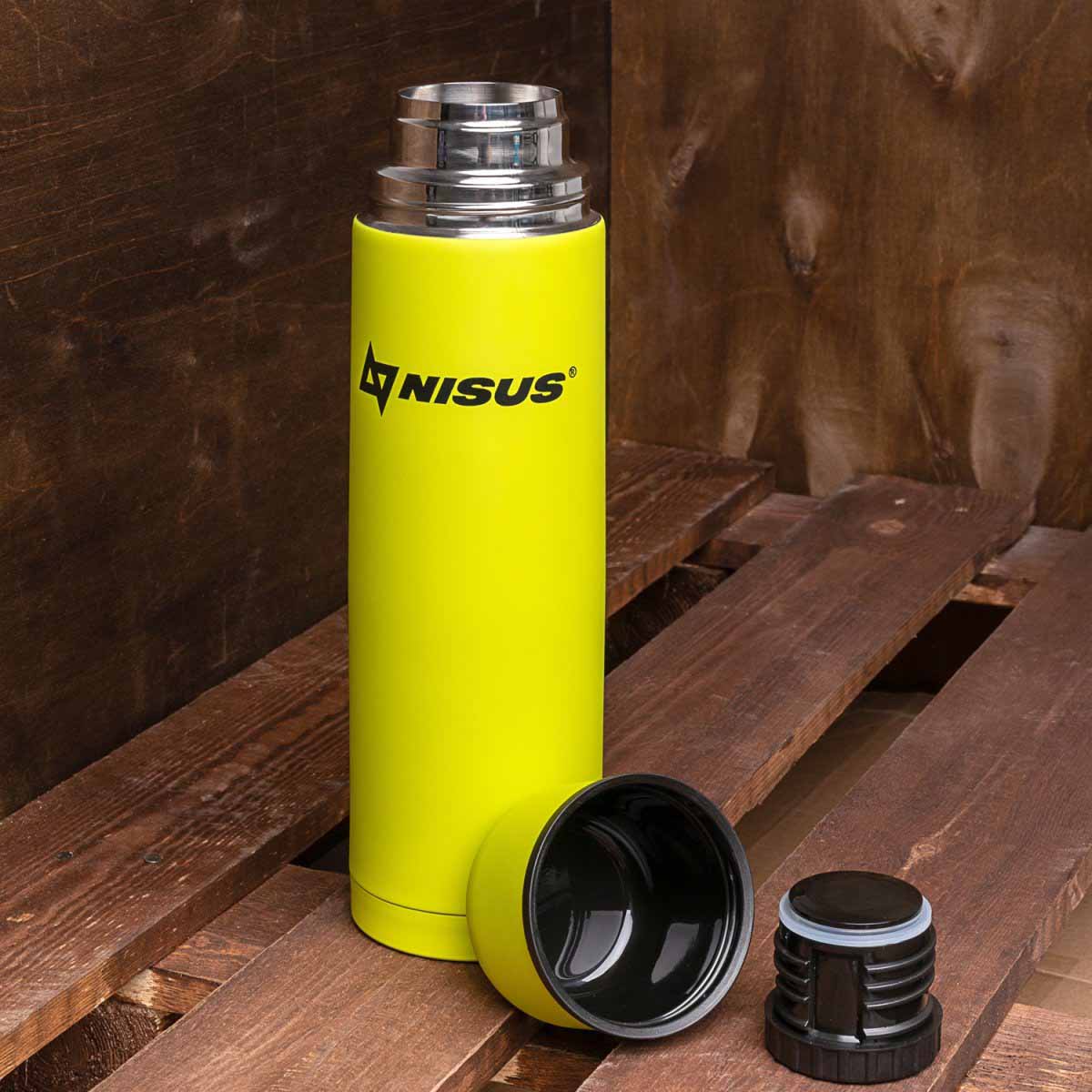 Compact Insulated Vacuum Flask with 2 Lid Cups, 33 oz, Limited Edition, lime is standing on the wooden bench