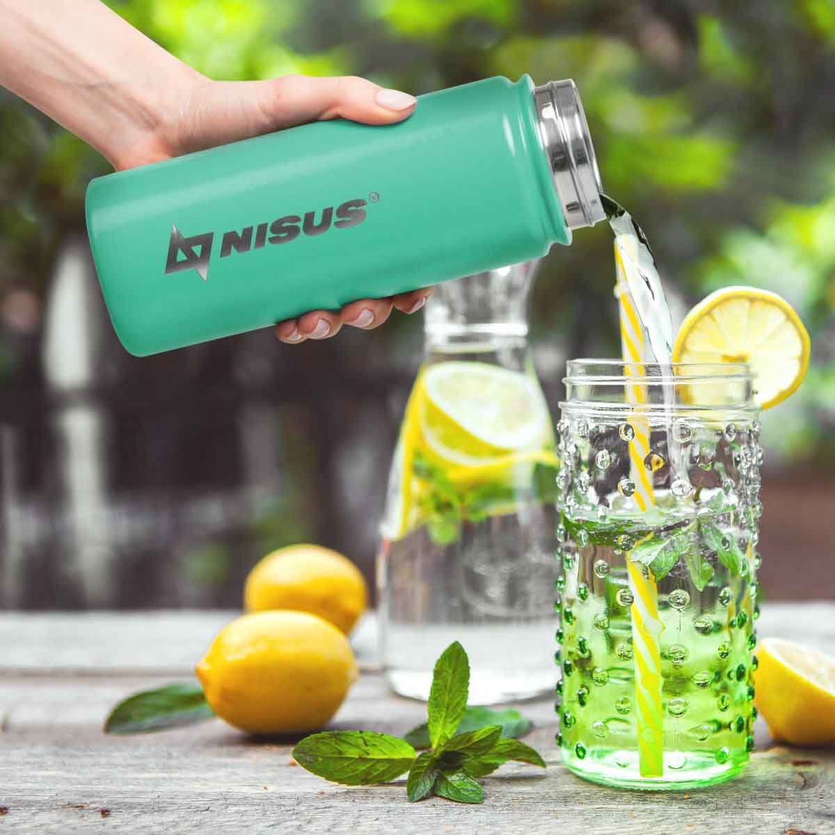 The water is pouring out of the Stainless Steel Insulated Sport Water Bottle with 3 Lid Types, 18 oz, Turquoise