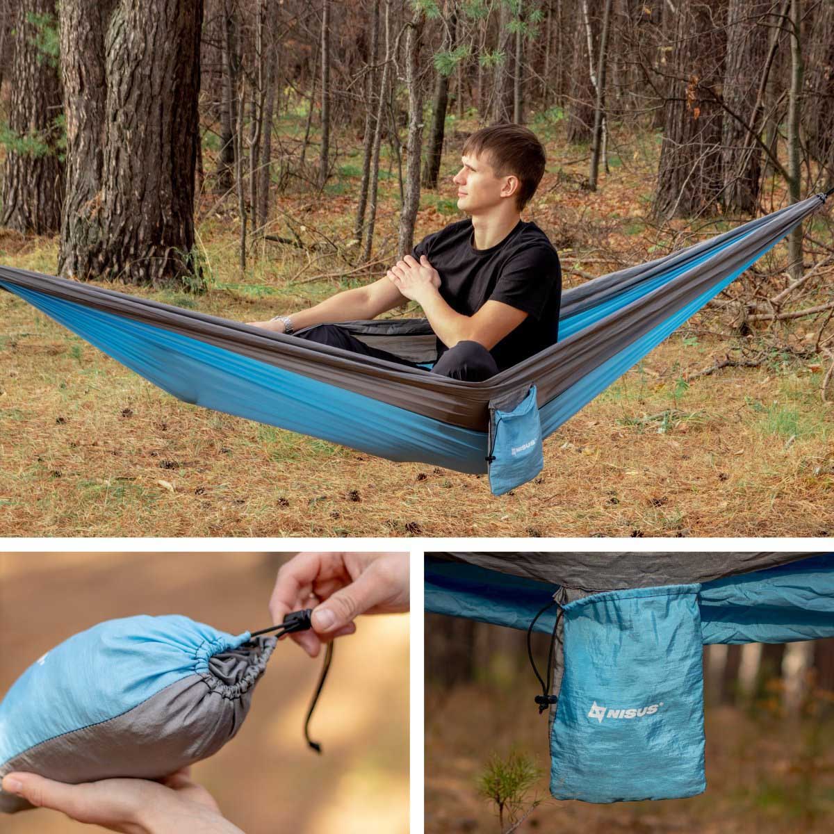 Man sitting in Nisus blue camping hammock in the forest