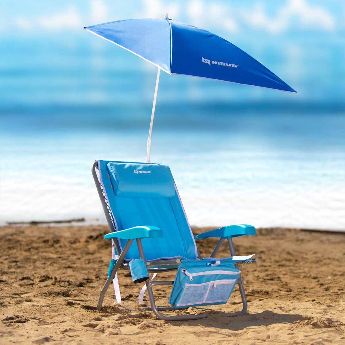 Premium Backpack Beach Chair with Cooler Bag and Headrest, Blue on the beach sand with a blue Strong Clip Adjustable Umbrella