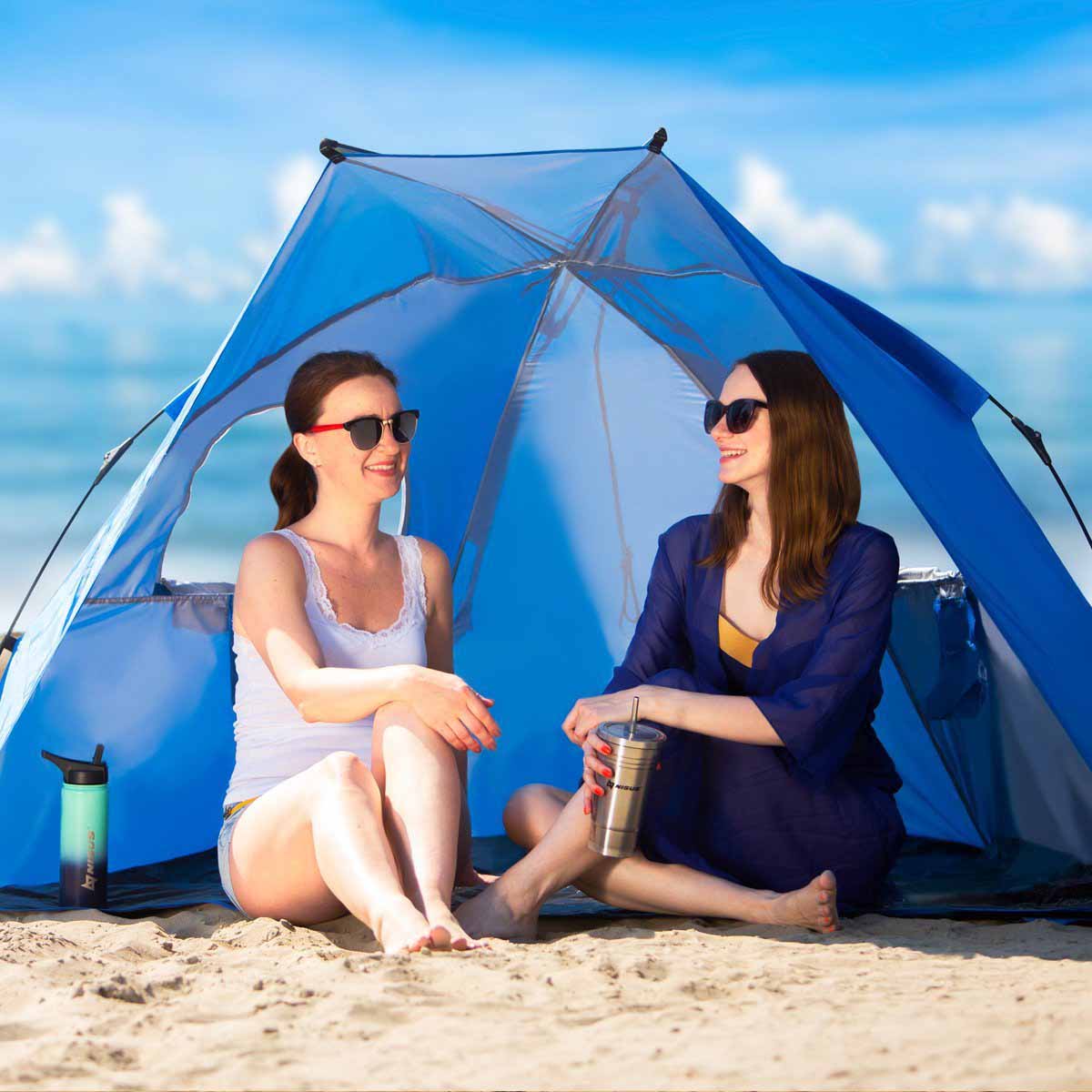 Two girls and sitting in a 2 Person Easy Up Beach Tent Sun Shade Shelter UPF 50+
