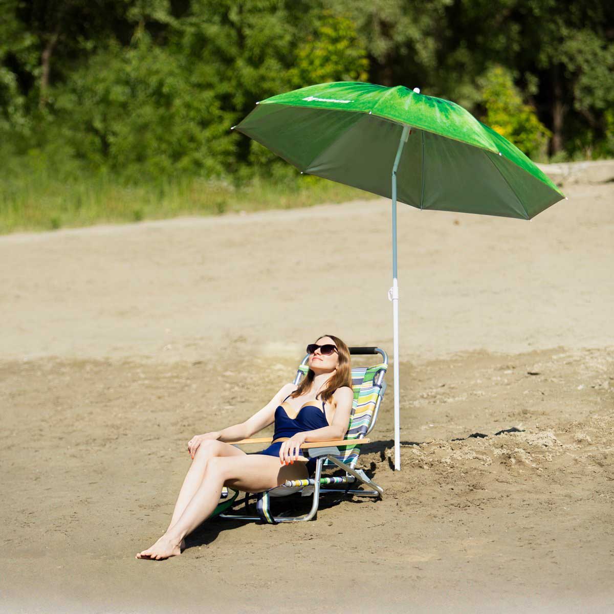 Girl sitting in the lounger under the Kiwi Folding Tilting Beach Umbrella