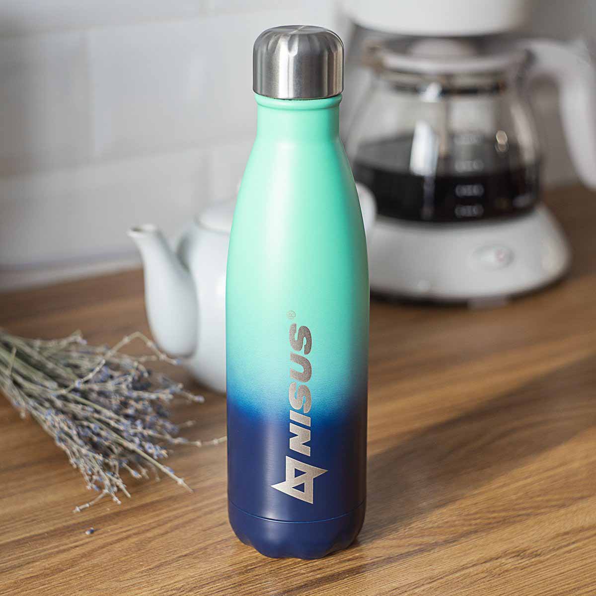 Stainless Steel Twist Top Water Bottle, Double Colored, 17 oz, Green and Black standing on the kitchen table