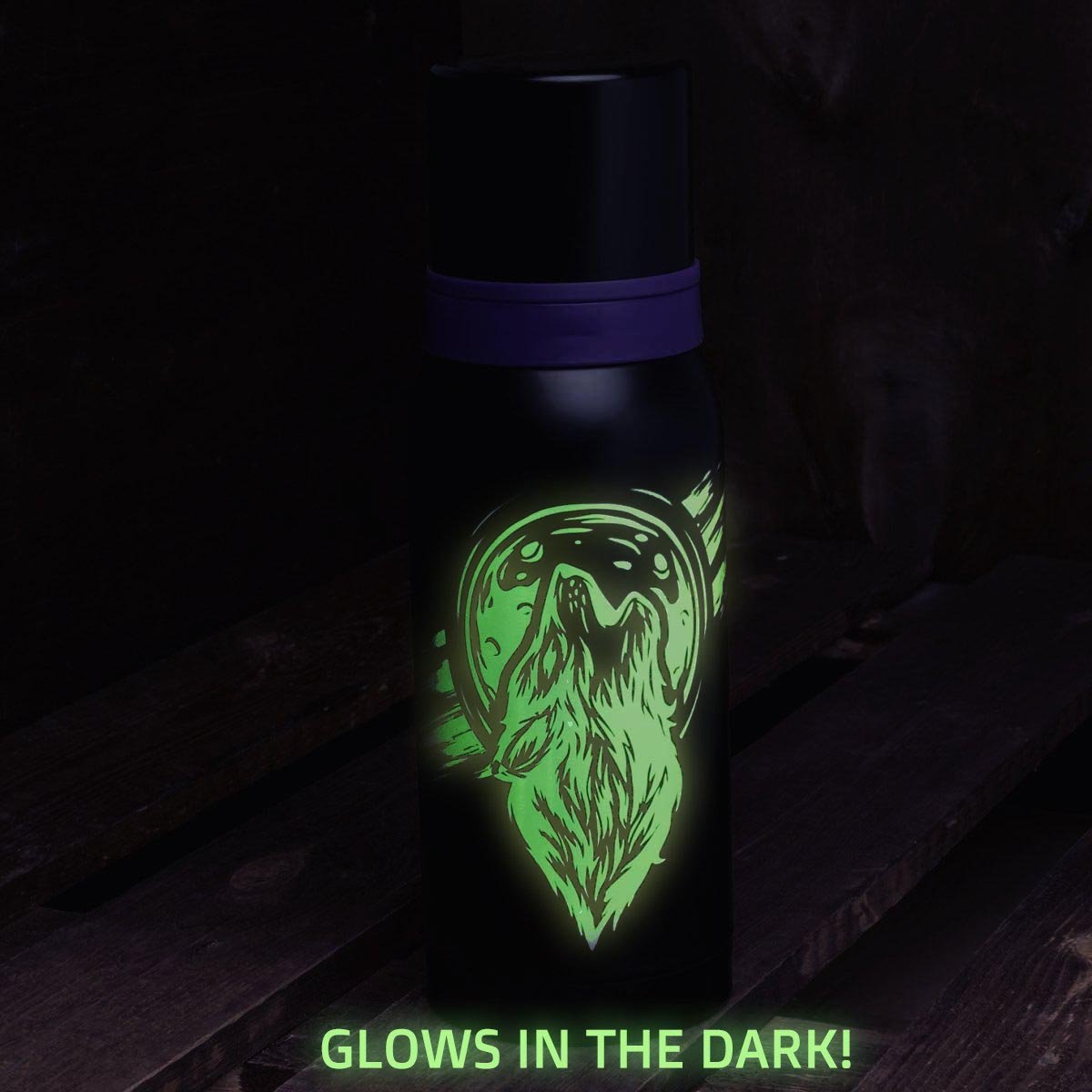 The wolf print on a Compact Stainless Steel Water Flask glows in the dark